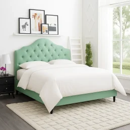 Modern mint green Amira Tufted Bed with a curved, button-tufted headboard, styled in a bright bedroom.