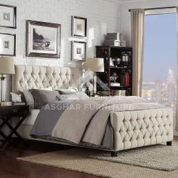 Luxurious Amul Tufted Bed with deep button tufting and nailhead trim, styled in an elegant bedroom.