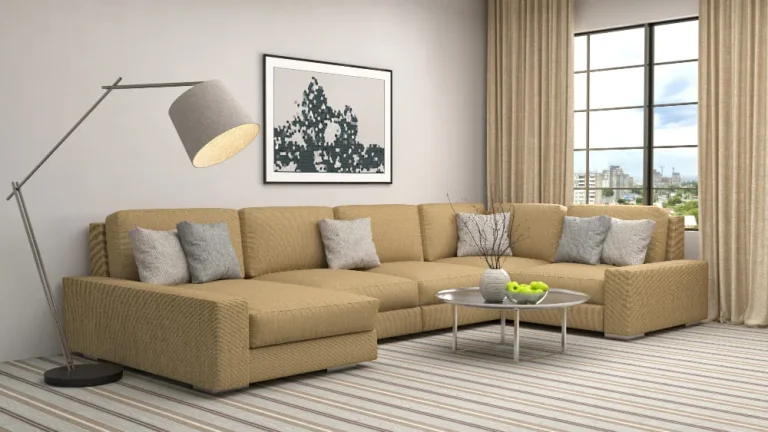 Alt tag - A contemporary living room featuring a tan sectional sofa, stylish decor, and ample natural light.