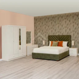 Modern bedroom set featuring an olive green upholstered bed with a unique headboard, white wardrobe, and matching nightstands